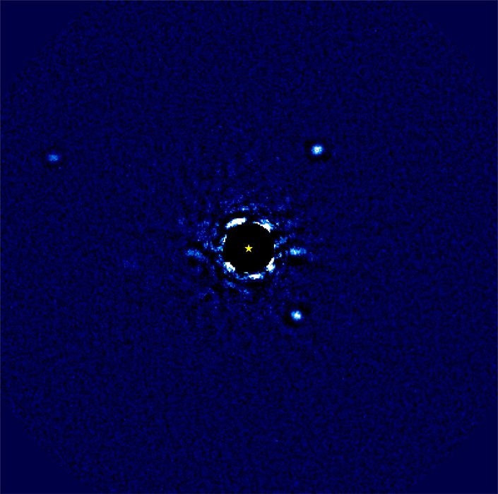 Circular orbits overlaid over four bright spots around disk